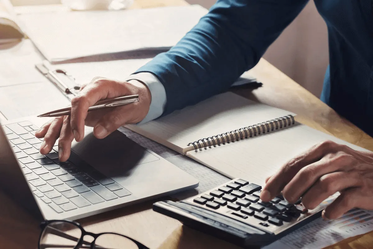 Reviewing financial statements against a calculator
