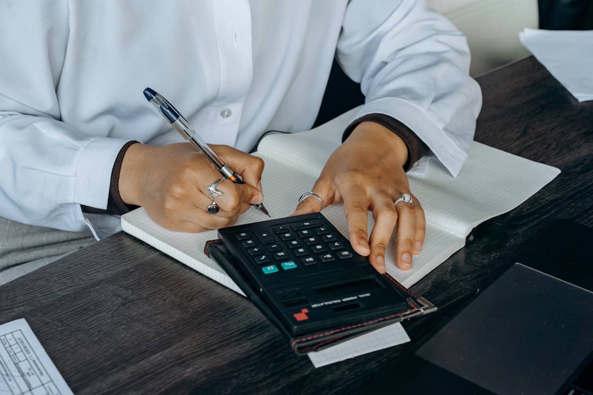 A board treasurer reading printed financial statements