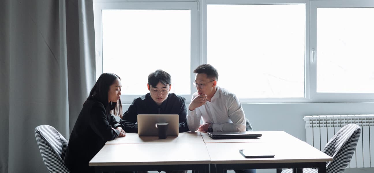 An internal audit team reviewing report findings